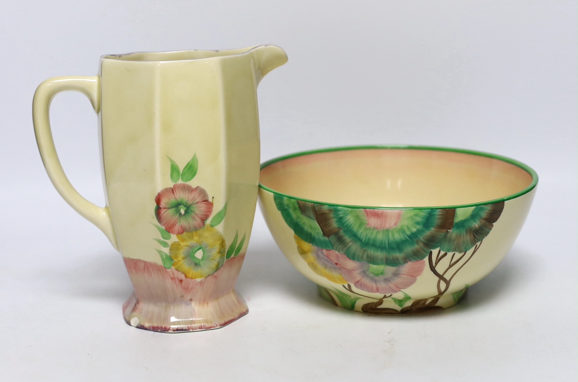 A Clarice Cliff Pink Pearls pattern jug and a related Wilkinson’s Honeyglaze bowl, Aurea pattern, 17cm